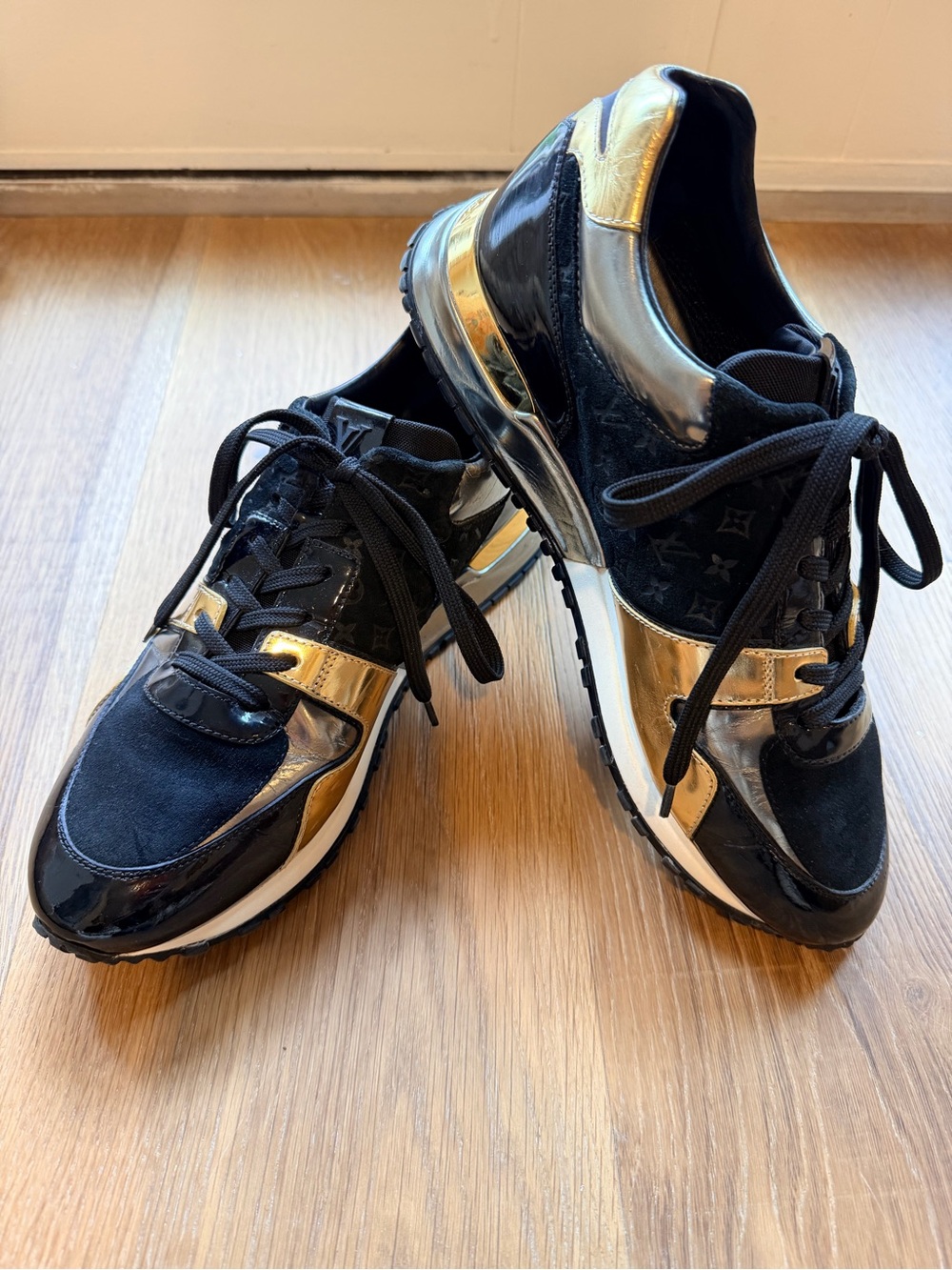 Louis Vuitton Black and Metallic Gold Low-Top Sneakers Authentic